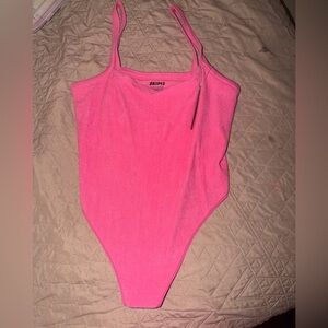 Women’s Pink One Piece bodysuit